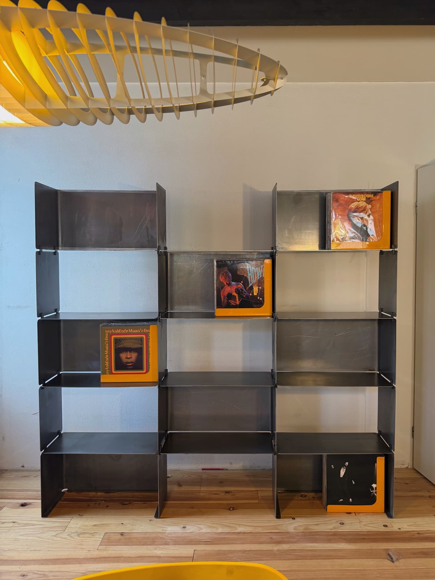 Shelving System 01 standing in a living room with records on display
